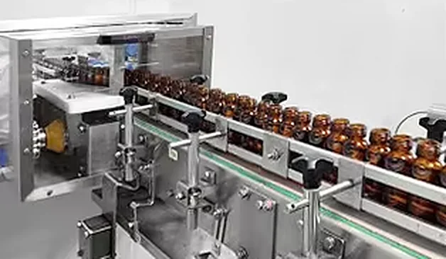 Automatic bottle filling and capping line